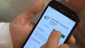 aplicativo do INSS indicando o bloqueio de benefícios INSS